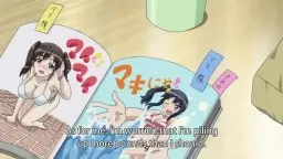 Zwei Hentai-Mädchen küssen sich in Manga auf Ladentisch